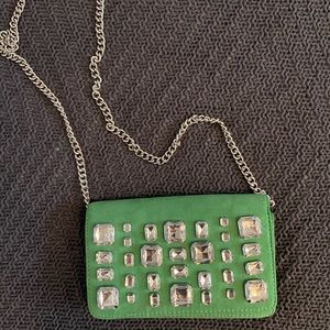 3/20$ Green Aldo clutch